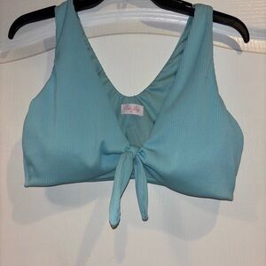Pink Lily Light Blue Bikini Top flawed, pull on fabric shown in pictures